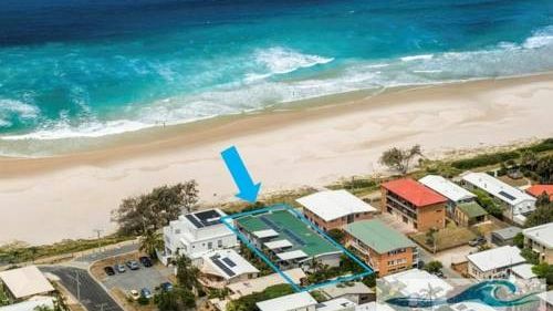 Aerial view of Tugun Beach and Sandbox Apartments