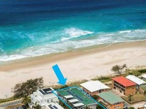 Bird's eye view of Tugun Beach and Sandbox Apartments