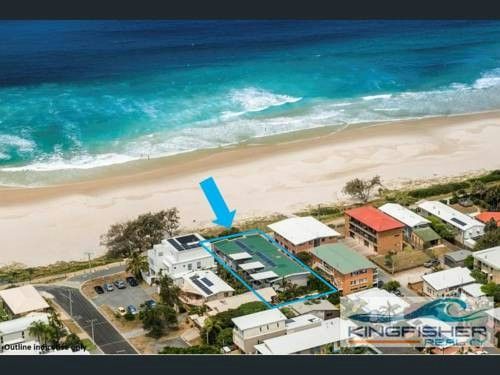 Aerial view of Tugun Beach and Sandbox Apartments